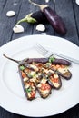 Eggplant with olive oil, basil and cherry tomatoes Royalty Free Stock Photo