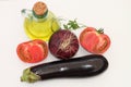 Eggplant, red onion, tomato and glass oil