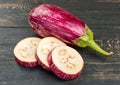 Eggplant with slices Royalty Free Stock Photo
