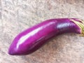 An Eggplant on Wooden Surface