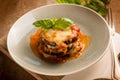 eggplants parmigiana with basil leaves Royalty Free Stock Photo