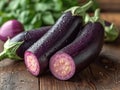 eggplants on wooden background