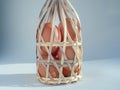Eggs in bamboo basket Royalty Free Stock Photo