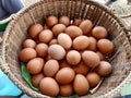 Eggs in basket made from bamboo weave. Royalty Free Stock Photo
