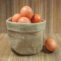 Eggs in basket on wood.eggs.egg.brown.rawfood Royalty Free Stock Photo