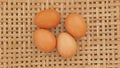Eggs on a basketwork background
