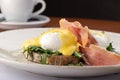 Eggs benedict with bacon Royalty Free Stock Photo