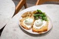 Eggs Benedict breakfast in a restaurant Royalty Free Stock Photo