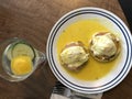 EGGS BENEDICT canadian bacon, poached eggs, hollandaise sauce Royalty Free Stock Photo