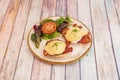 Eggs Benedict, consists of two halves of an English muffin, toast or other types Royalty Free Stock Photo