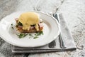 Eggs Benedict in the context of a hollandaise sauce Royalty Free Stock Photo