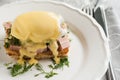 Eggs Benedict in the context of a hollandaise sauce Royalty Free Stock Photo