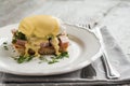 Eggs Benedict in the context of a hollandaise sauce Royalty Free Stock Photo