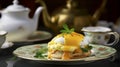 Eggs Benedict English muffin consists of toasted muffin topped with eggs, bacon and sauce Royalty Free Stock Photo