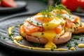 Eggs Benedict with salmon and rosemary