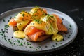 Eggs Benedict with salmon and rosemary