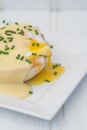 Eggs Benedict toasted English muffins ham poached eggs and hollandaise sauce Royalty Free Stock Photo