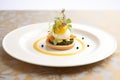 eggs benedict with a touch of caviar, served on fine diningware Royalty Free Stock Photo