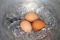 Eggs, Boiled egg in the pan, Raw Egg Reddish yellow in Hot water is boiling cooking Selective Focus Royalty Free Stock Photo