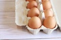 Fresh raw eggs in a paper egg container Royalty Free Stock Photo