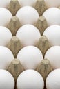 Eggs in a carton on a white background. close-up white egg. Royalty Free Stock Photo