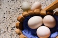 Eggs in the wooden basket.