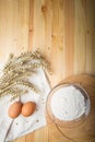 Kitchen still life from flour, wheat ears and eggs Royalty Free Stock Photo