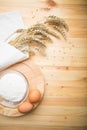 Kitchen still life from flour, wheat ears and eggs Royalty Free Stock Photo