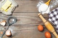 Eggs, flour, butter on the wooden table. Basic baking background Royalty Free Stock Photo