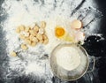 Eggs, flour and pasta for cooking in kitchen with Italian cuisine, dough recipe and dinner ingredients. Gnocchi, table Royalty Free Stock Photo