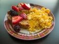 Eggs Fruit and French Toast Breakfast Plate Royalty Free Stock Photo