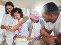 Eggs are a lot like love, they hold everything together. a couple baking at home with their two children.