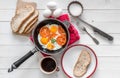 Eggs overeasy in a frying pan, topview