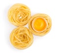 Eggs and paste tagliatelleon isolated on the white Royalty Free Stock Photo