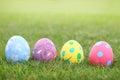 Eggs pastel on grass background in ester day