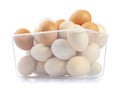 Eggs in plastic box on white background Royalty Free Stock Photo
