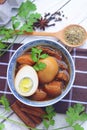 eggs and pork in brown sauce. three layer pork with eggs in sweet gravy sauce. braised pork belly and chicken eggs in soy sauce wi Royalty Free Stock Photo