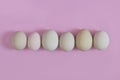 Eggs in a row similars but at the same time differents. Concept of equality Royalty Free Stock Photo
