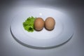 Eggs and salad on a white plate