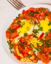 Eggs in a sauce of tomatoes, chili peppers, and onions Royalty Free Stock Photo