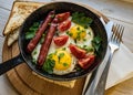Eggs with sausages and vegetables Royalty Free Stock Photo