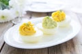 Eggs stuffed with cheese and avocado mousse