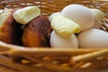 Eggs, sweets, frame nuts and pies in the basket.