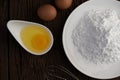 Eggs, tapioca flour and an egg beater, ingredients used in bakery Royalty Free Stock Photo