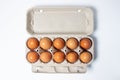 Eggs on a white background. Chicken eggs in a paper box Royalty Free Stock Photo