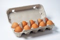 Eggs on a white background. Chicken eggs in a paper box Royalty Free Stock Photo