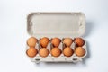 Eggs on a white background. Chicken eggs in a paper box Royalty Free Stock Photo