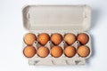 Eggs on a white background. Chicken eggs in a paper box Royalty Free Stock Photo