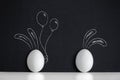 Eggs witn painted rabbirs on the black background Royalty Free Stock Photo