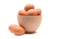 Eggs in a wooden bowl isolated on white background Royalty Free Stock Photo